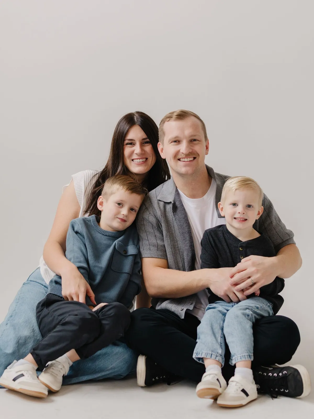 Dr. Grant with his wife and their two young sons